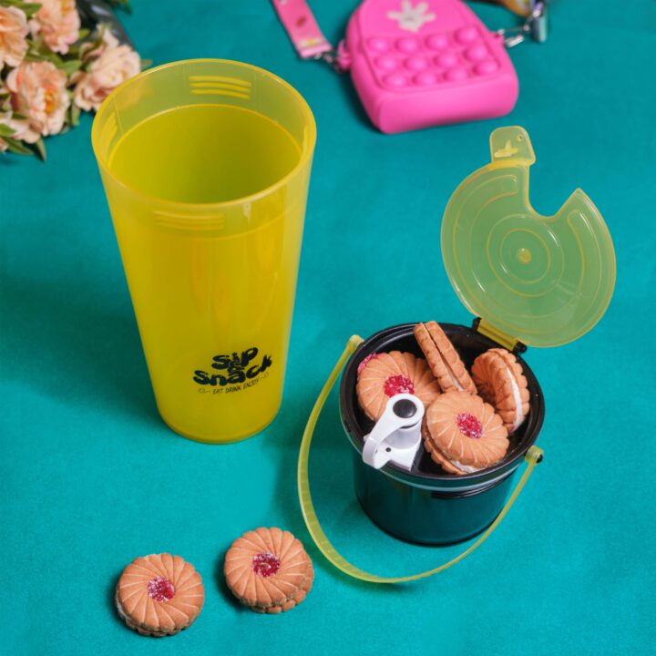 Lumiset Yellow Sip and Snack bottle with Biscuits and some decorated